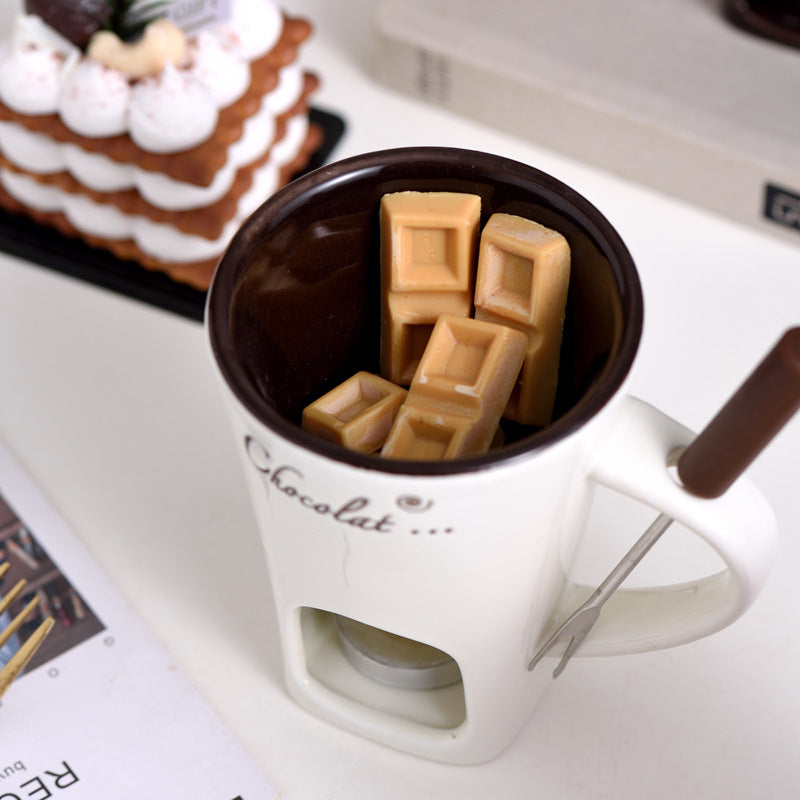 Chocolate pieces melting in the white mug